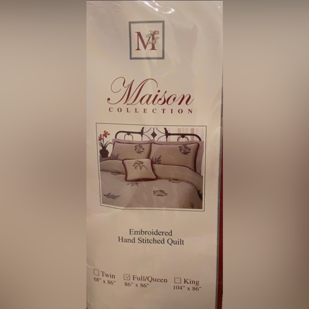 Queen size quilt. Hand embroidered. Cream colored, with flowers.Never used.